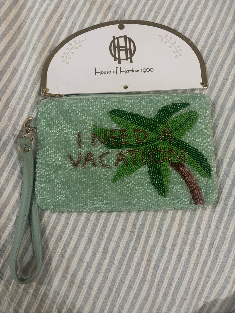 House of Harlow 1960 Mint Beaded 'I Need a Vacation' Wristlet with Palm Motif